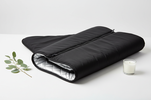 AURAVITA Infrared Sauna Wrap — premium black sauna blanket partially unrolled showing interior lining and zipper