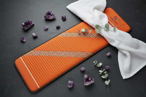 Amethyst Infrared Heat Mat flat lay with raw crystals and eucalyptus